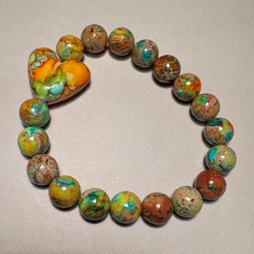 bracelet brings a bright, artistic, and joyful feel to any outfit